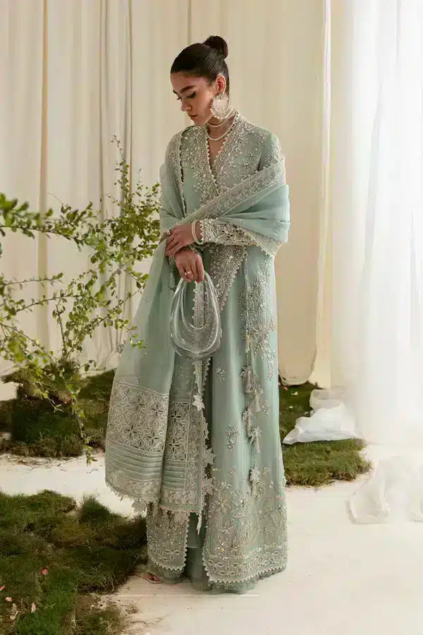 A sky blue gown with it's unique style introduced by Suffuse by Sana Yasir | Freeshia Formals 23 | Ilana - House Of Anaya