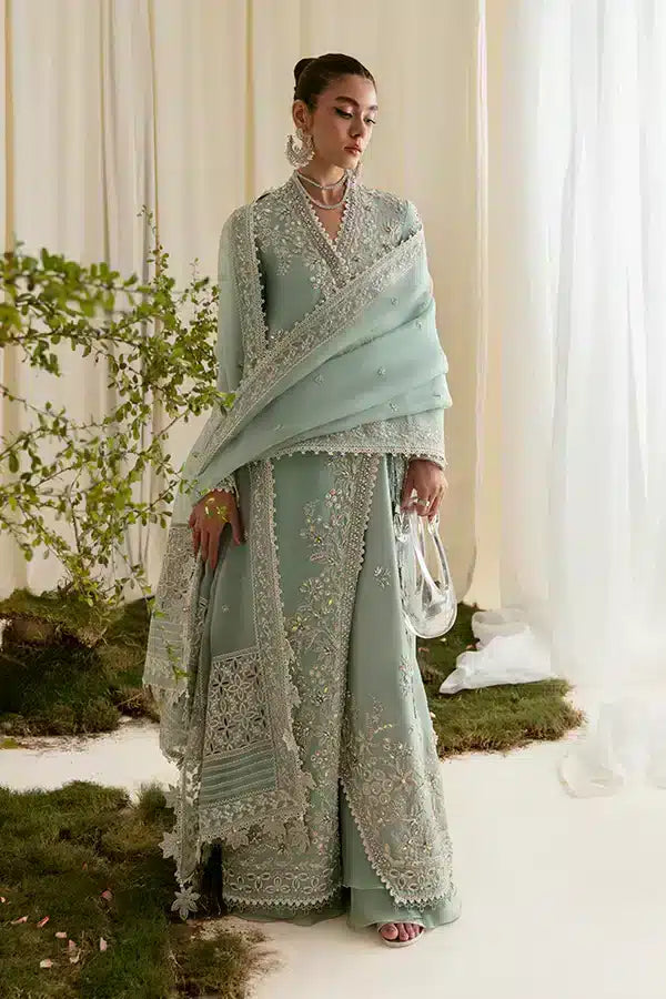 A sky blue gown with it's unique style introduced by Suffuse by Sana Yasir | Freeshia Formals 23 | Ilana - House Of Anaya